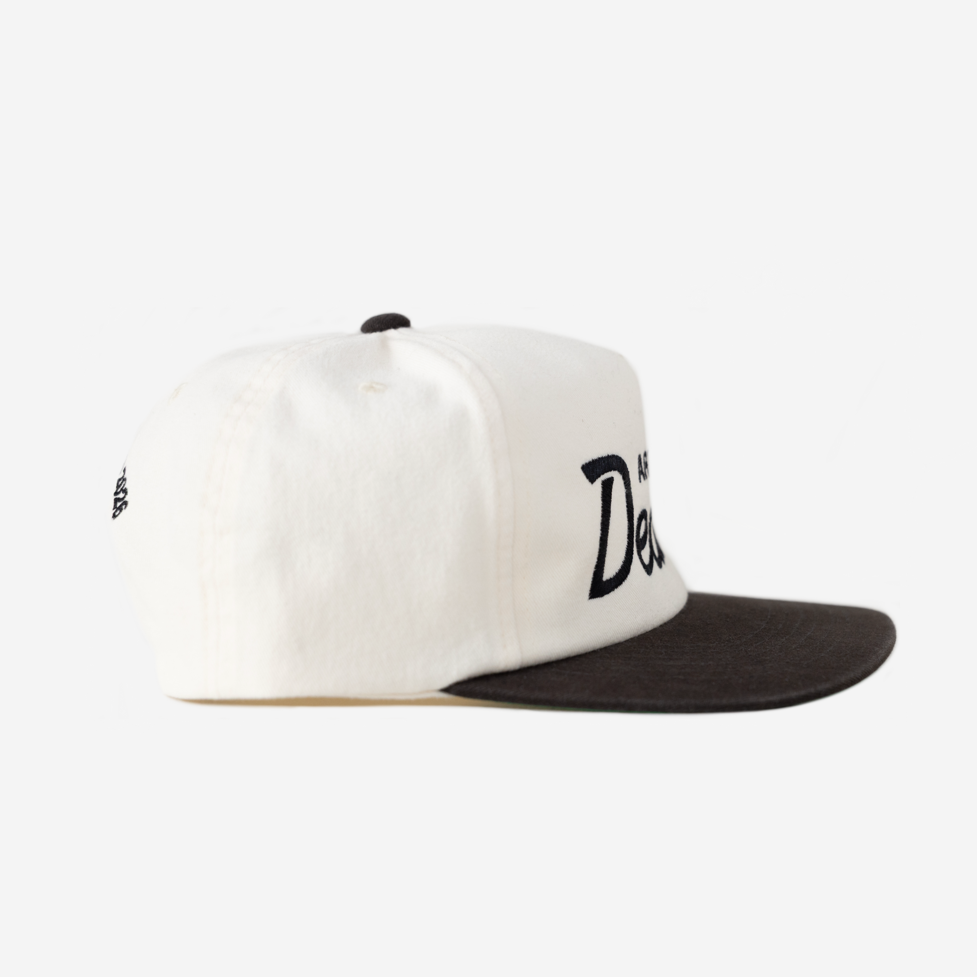 CREATIVE DIRECToR THRoWBACK HAT (IVoRY)
