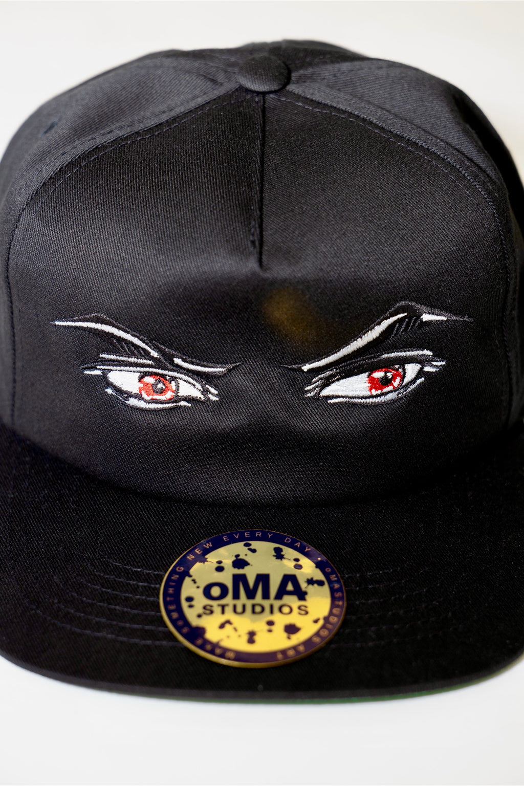 BAD ANIME EYES HAT (GREEN BRIM)